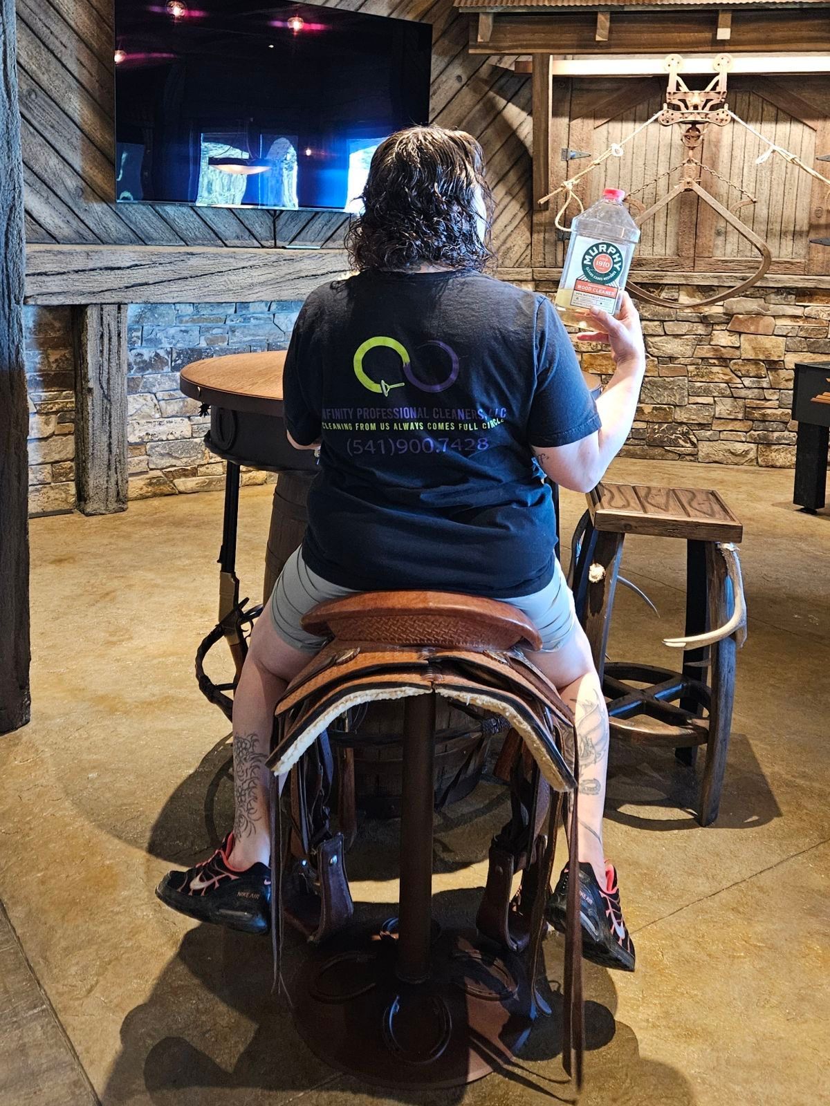 Team member applying leather cleaner